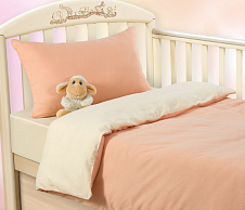 Детское однотонное постельное белье в кроватку 120х60 с простыней на резинке 60x120 Нежный персик, кулирка, Ясельный фото