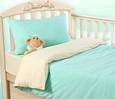 Детское однотонное постельное белье в кроватку 120х60 с простыней на резинке 60x120 Мятный крем, кулирка, Ясельный фото
